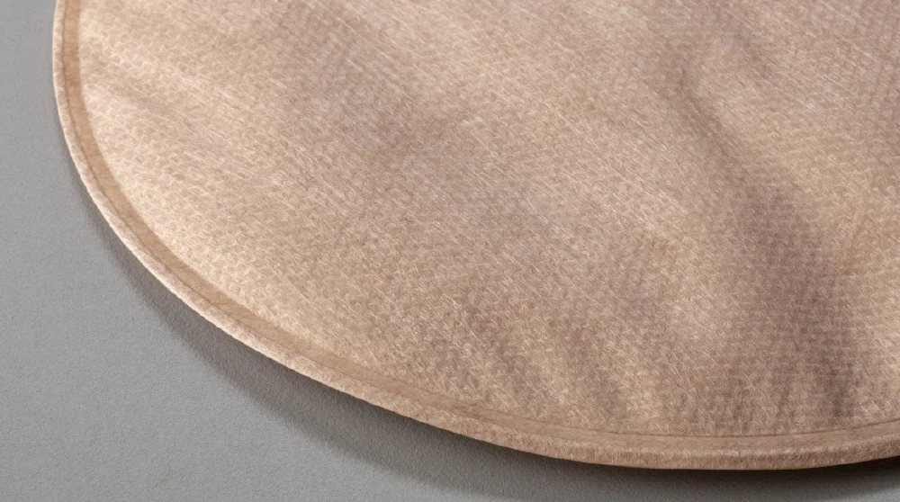 an opaque (Tan-colored pouch)